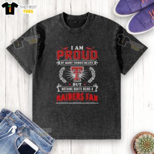 Alt Text: Texas Tech Red Raiders fan proudly wearing a washed t-shirt that celebrates their team spirit and loyalty.