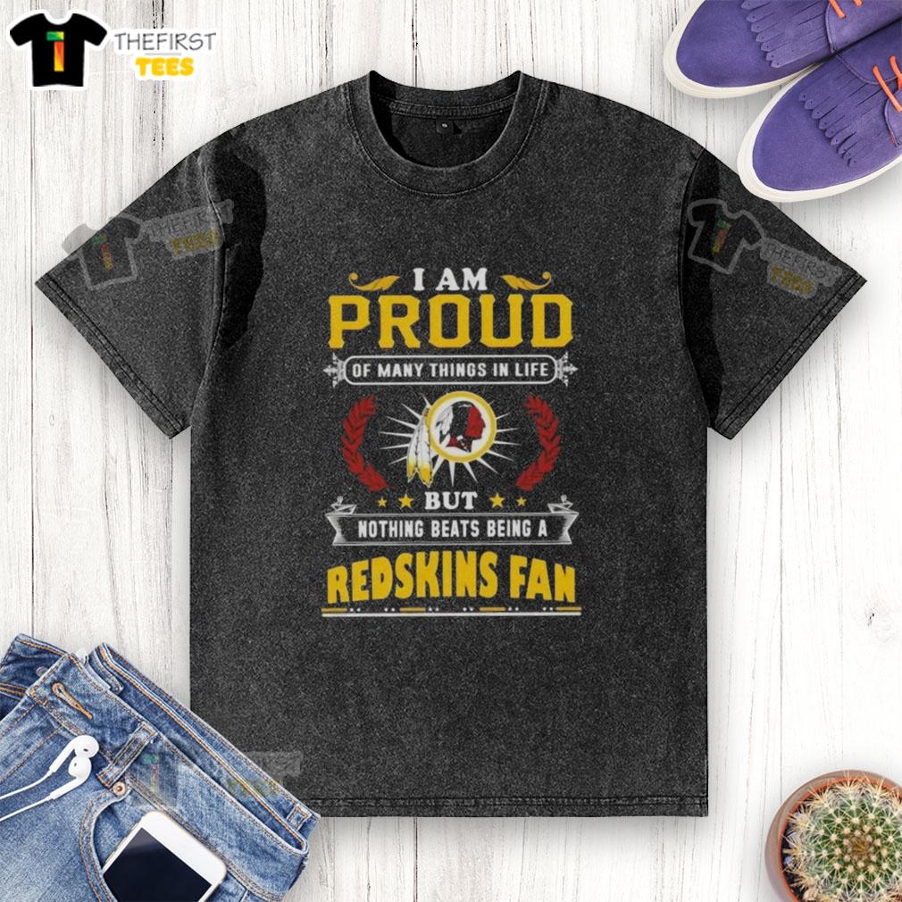 Alt Text: Worn Washington Redskins fan t-shirt with the phrase 'I'm Proud of Many Things, But Nothing Beats Being a Redskins Fan.'
