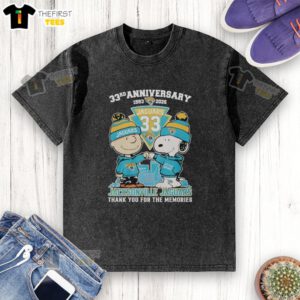 Top Jacksonville Jaguars outfit featuring Snoopy and Charlie Brown, celebrating 33rd anniversary, 1993-2026, washed t-shirt.