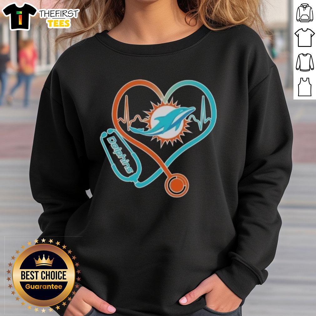 Miami Dolphins sweatshirt featuring stethoscope headphones, perfect for fans showcasing team spirit and style.