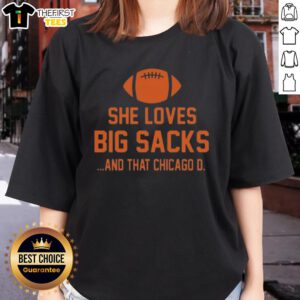 Top She Loves Big Sacks and That Chicago D Ladies Tee featuring a stylish graphic design in vibrant colors.