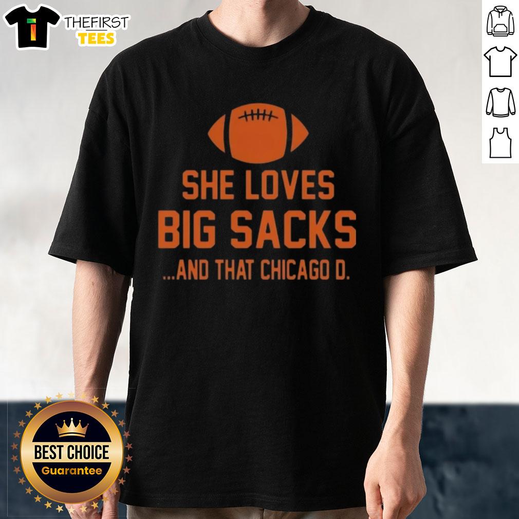 Alt Text: Top She Loves Big Sacks And That Chicago D T-Shirt displayed on a mannequin, showcasing a trendy and playful design.