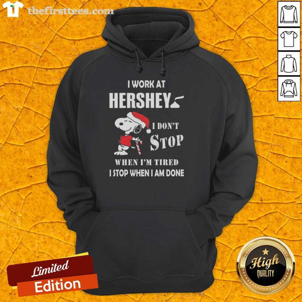 Alt Text: Snoopy Christmas hoodie with 'I Work At Hershey I Dont Stop When Im Tired I Stop When I Am Done' design.