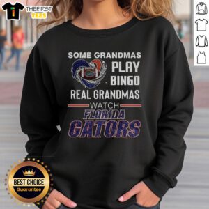 Cozy Florida Gators sweatshirt featuring 'Real Grandmas Watch' design, perfect for game day and bingo lovers.