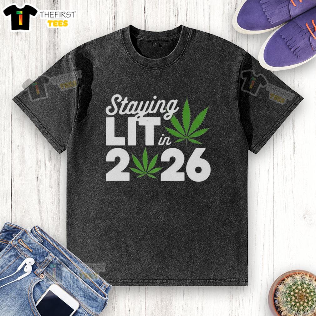 Top Staying Lit in 2026 Marijuana Meme on a Washed T-Shirt featuring a vibrant cannabis design and playful text.