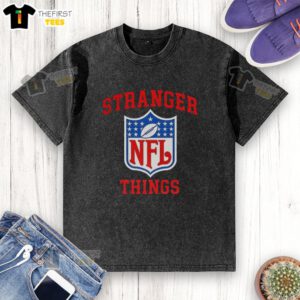 Alt Text: Top Stranger Things X NFL logo washed t-shirt featuring a vintage design and soft fabric, perfect for fans.
