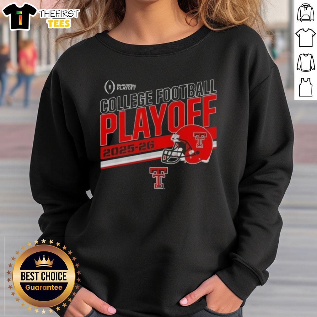 Alt Text: Top Texas Tech Red Raiders 2025 CFB Playoff stripe football helmet sweatshirt displayed on a wooden background.