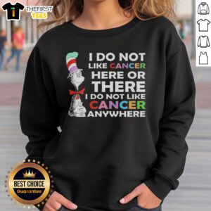 Cozy sweatshirt featuring 'I Do Not Like Cancer Here or There' inspired by The Cat in the Hat, perfect for cancer awareness.
