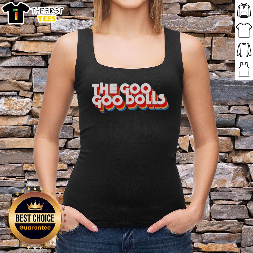 Neil Barrow wearing the Goo Tank Top from Top The Diplomat, showcasing a stylish and modern design.