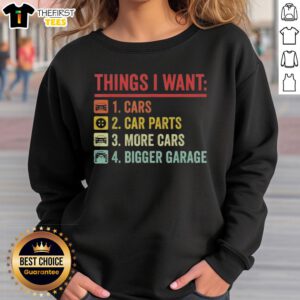 Cozy sweatshirt featuring 'Top Things I Want: Car Parts, More Cars, Bigger Garage,' perfect for car enthusiasts.