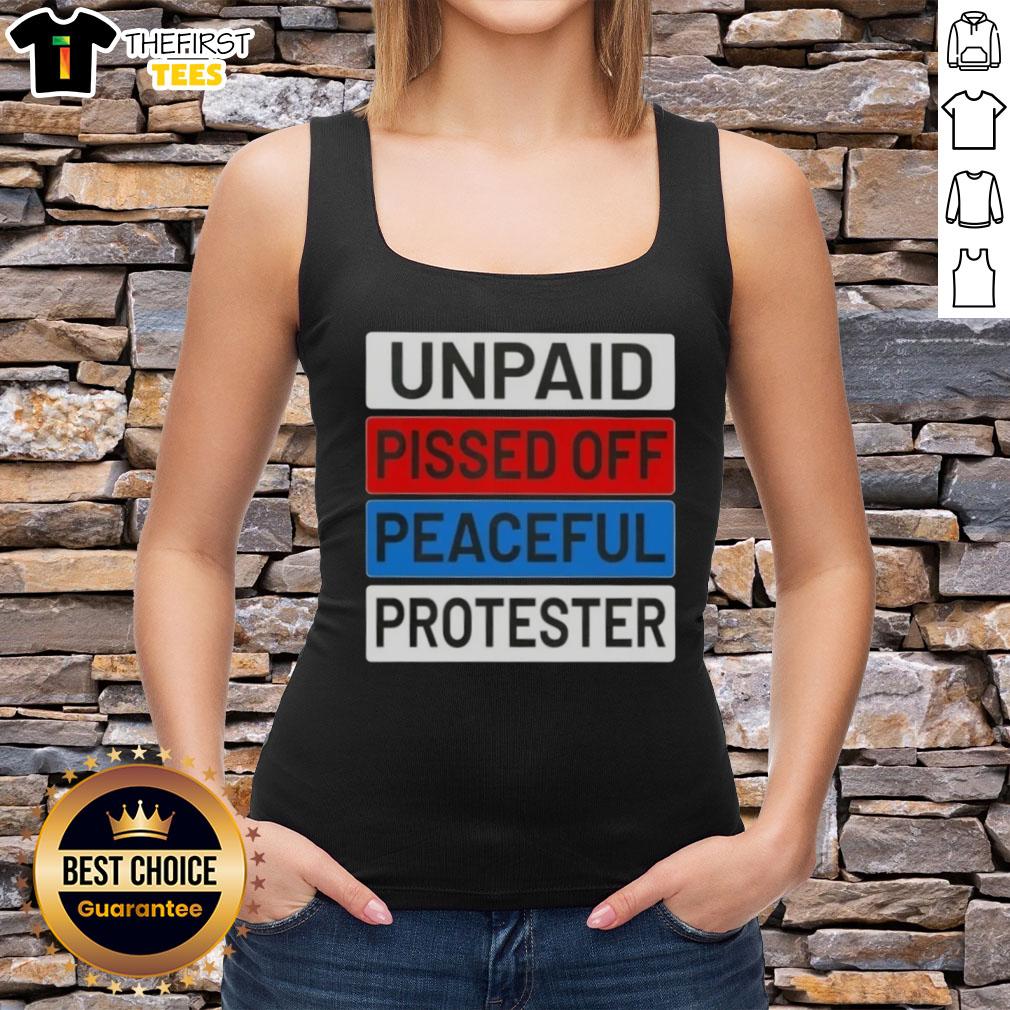 Unpaid peaceful protester wearing a tank top with 'Top Unpaid Pissed Off' slogan at a rally, showcasing activism.