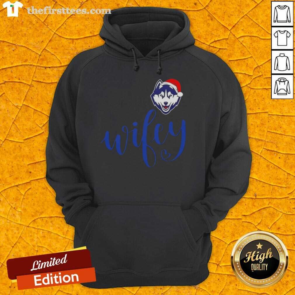 Alt Text: Top Wifey Connecticut Huskies hoodie with Santa hat for a festive Merry Christmas look.