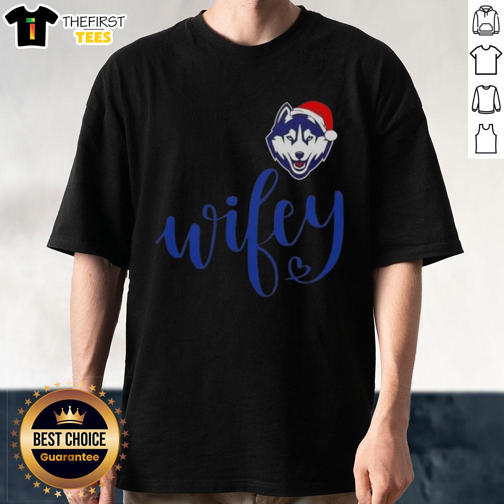 Alt Text: Top Wifey Connecticut Huskies Santa Hat Merry Christmas T-Shirt design featuring festive graphics and holiday cheer.