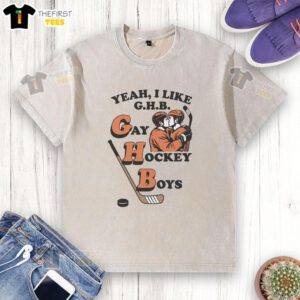 Top Yeah I Like G.H.B. Gay Hockey Boys washed t-shirt featuring vibrant colors and a fun graphic design.