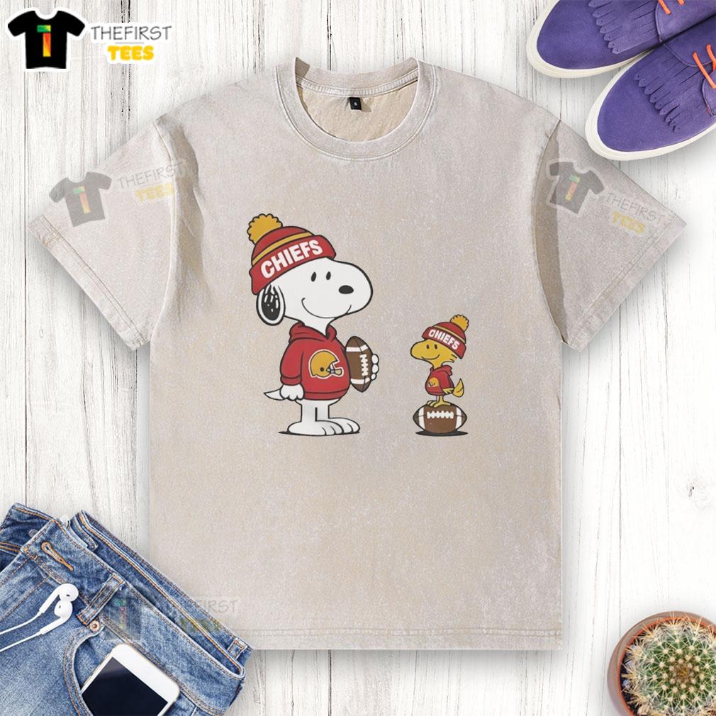 Alt Text: Cute Kansas City Chiefs Snoopy Woodstock football NFL washed t-shirt featuring vibrant graphics and a relaxed fit.