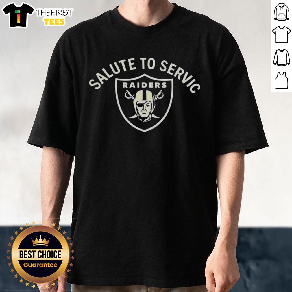 Good Coach Pete Carroll wearing a Las Vegas Raiders NFL Salute To Service logo T-shirt, showcasing team pride and support.