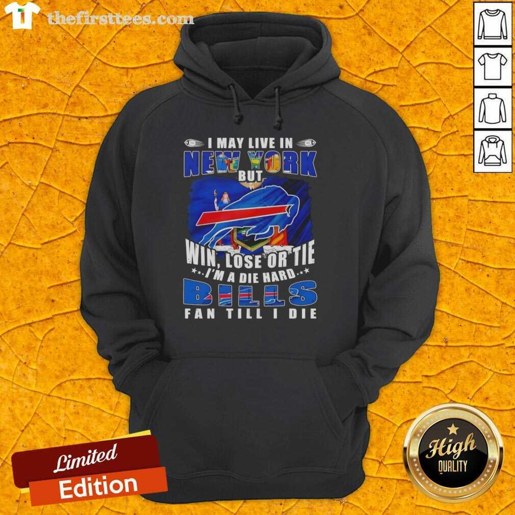 Die-hard Buffalo Bills fan wearing a hoodie that says 'Hot, I May Live in New York, But I'm a Bills Fan Till I Die.'