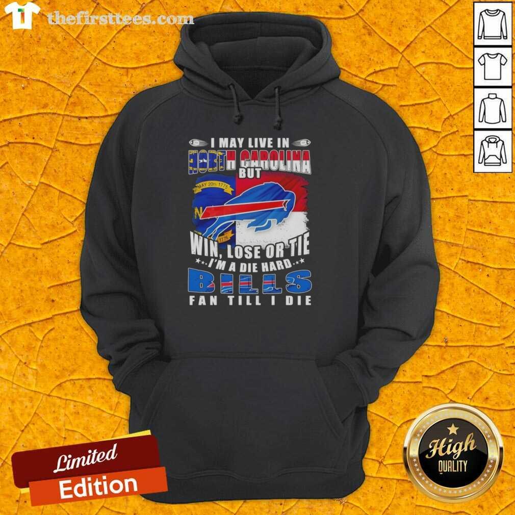 Die-hard Buffalo Bills fan wearing a hoodie with 'I may live in North Carolina, but I'm a Bills fan till I die.'