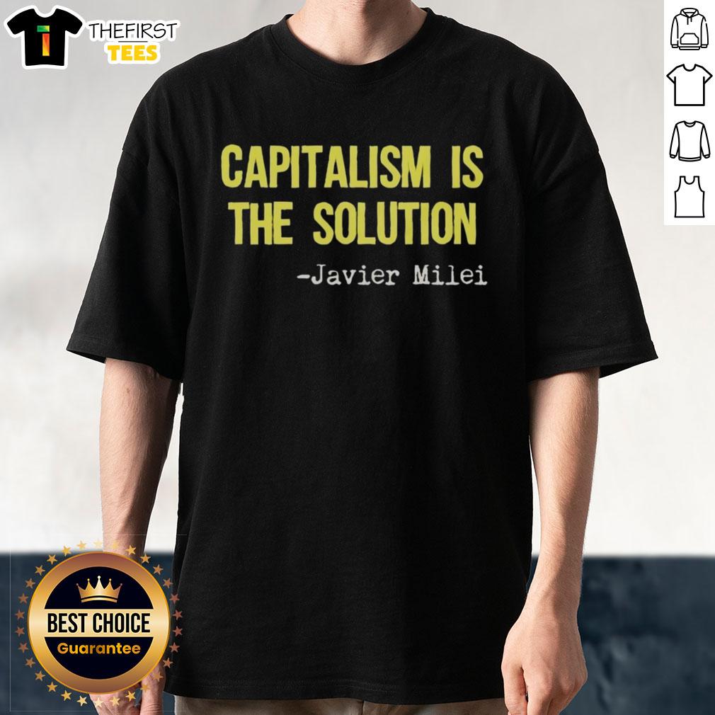 Alt Text: Official Javier Milei Capitalism Is The Solution T-Shirt featuring bold text design in vibrant colors.