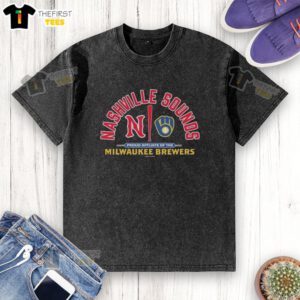 Official Nashville Sounds Proud Affiliate of the Milwaukee Brewers washed t-shirt displayed on a hanger.