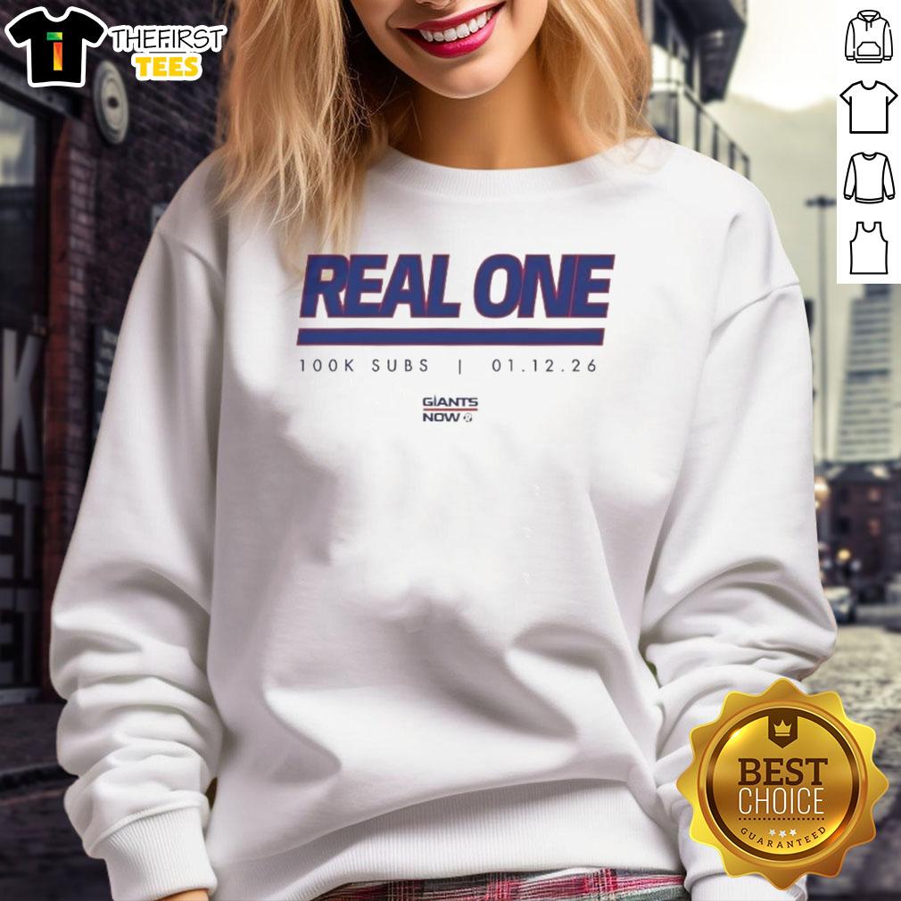 Alt Text: Official New York Giants Real One K Subs sweatshirt featuring team logo and comfortable fit for fans.