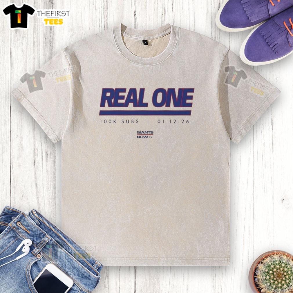 Alt Text: Official New York Giants Real One K Subs washed t-shirt featuring team logo and vibrant colors for fans.
