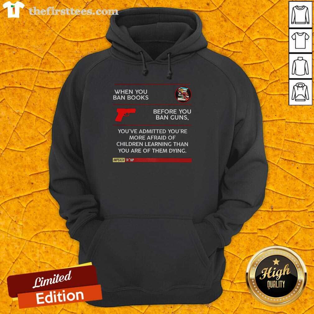 Alt Text: Official hoodie featuring the quote on banning books vs. guns, highlighting fears of children's education.