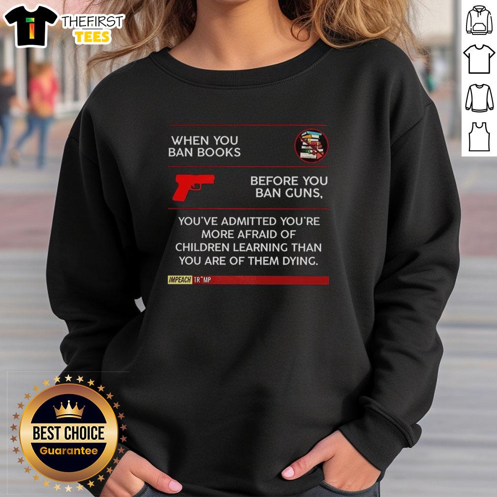 Official sweatshirt featuring the quote on banning books and guns, highlighting concerns about children's learning.