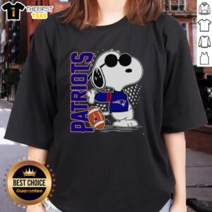 Original Peanuts Snoopy x New England Patriots football ladies tee featuring Snoopy in team colors for fans.