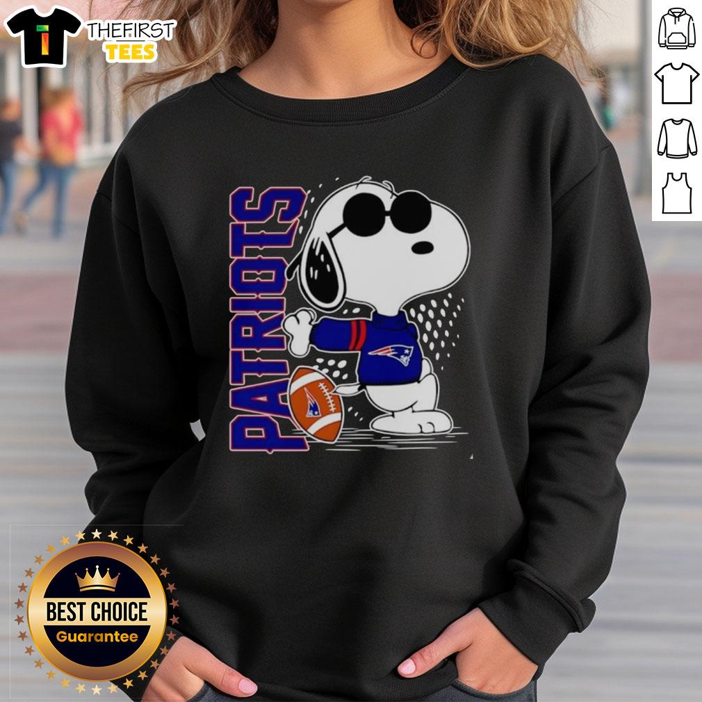 Original Peanuts Snoopy x New England Patriots football sweatshirt featuring Snoopy in team colors.