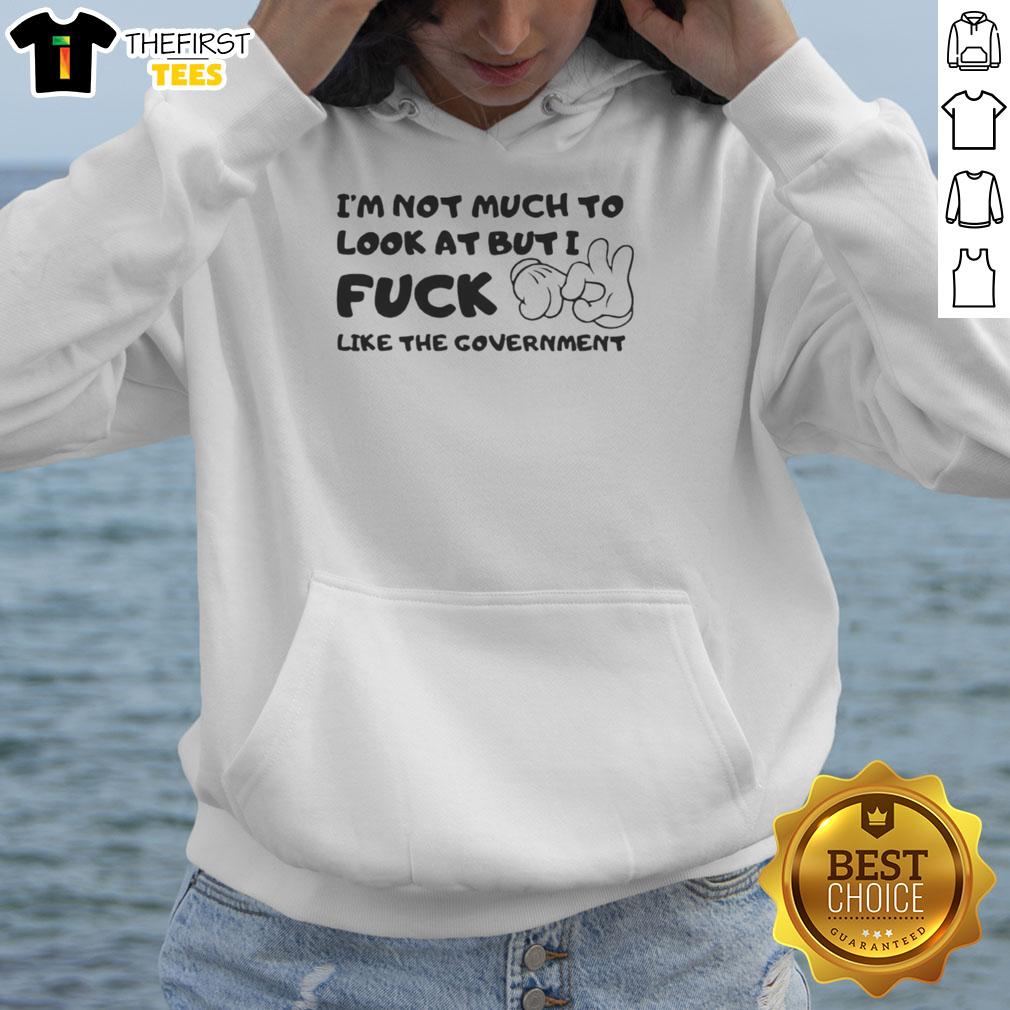 Premium 'I'm Not Much To Look At But I Fck Like The Government' hoodie in black, showcasing a bold graphic design.