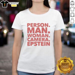 Premium person wearing Epstein ladies tee, posing with a camera, showcasing stylish casual wear for men and women.