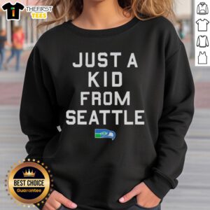 Alt Text: Premium Seattle Seahawks 'Just A Kid From Seattle' sweatshirt featuring team colors and logo, perfect for fans.