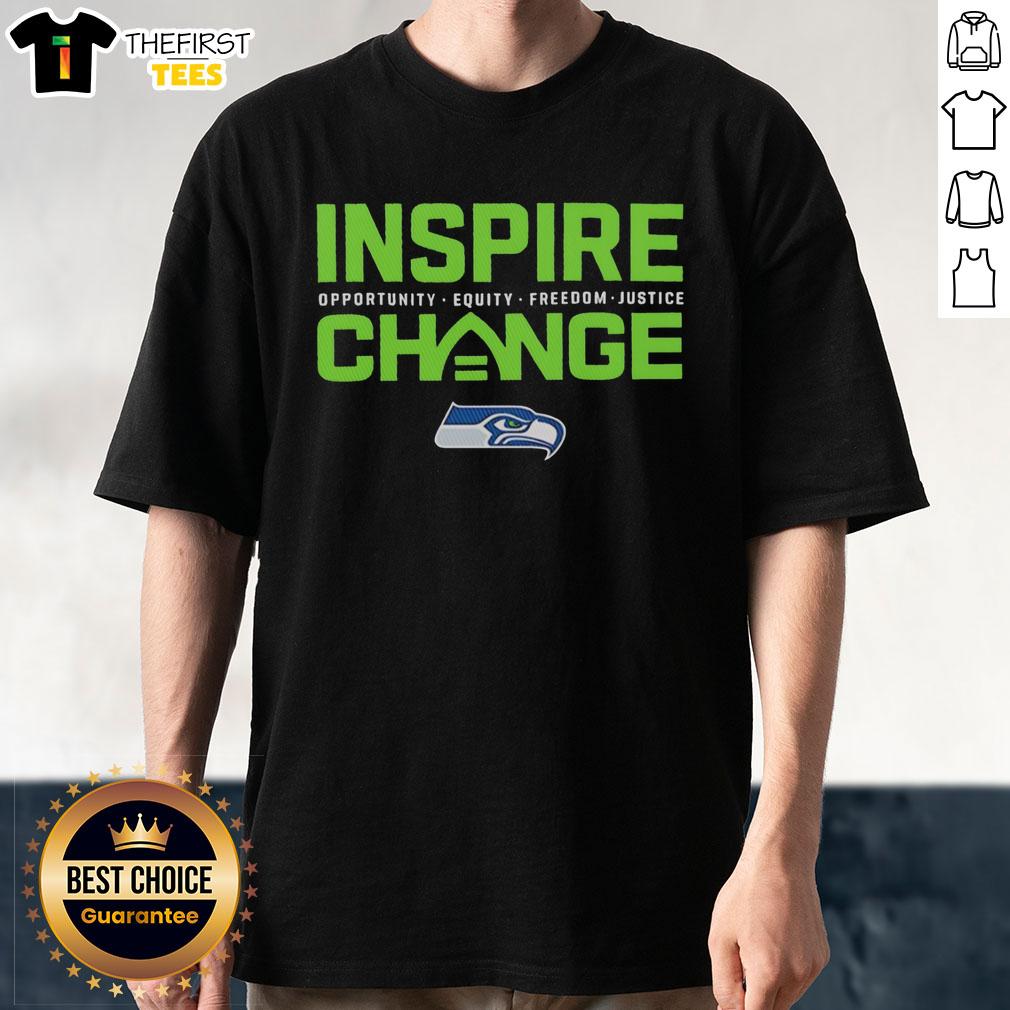 Premium Seattle Seahawks small logo T-shirt promoting change, equity, freedom, and justice for all.