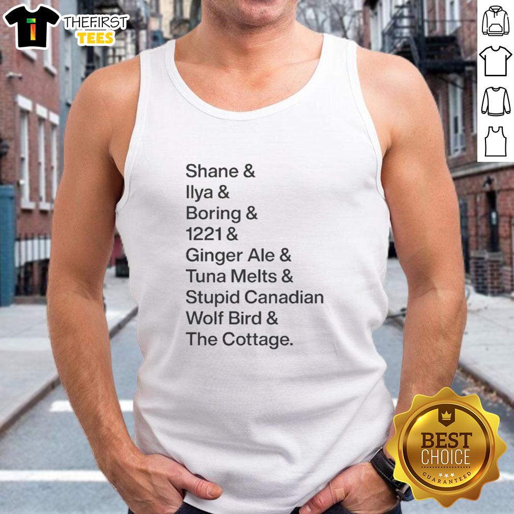 Alt Text: Premium Shane Ilya Boring Ginger Ale tank top featuring a whimsical Canadian wolf bird design at The Cottage.