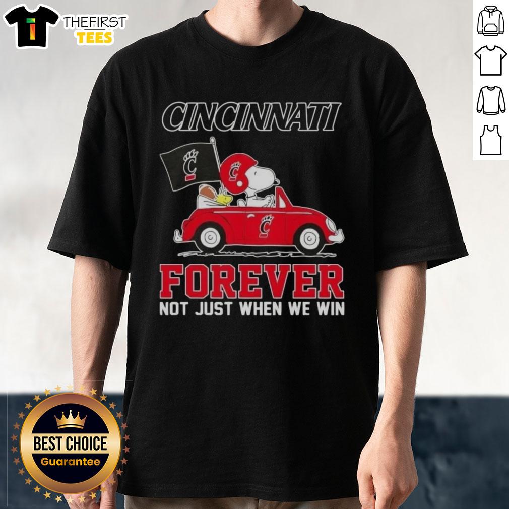 Pretty Peanuts Snoopy driving a car on a Cincinnati Bearcats Forever T-shirt, perfect for fans celebrating team spirit.