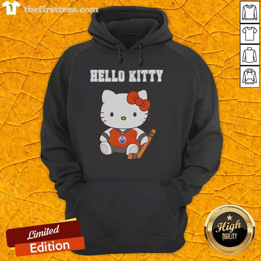 Adorable Edmonton Oilers x Hello Kitty night hoodie featuring a cute design perfect for fans and cozy wear.
