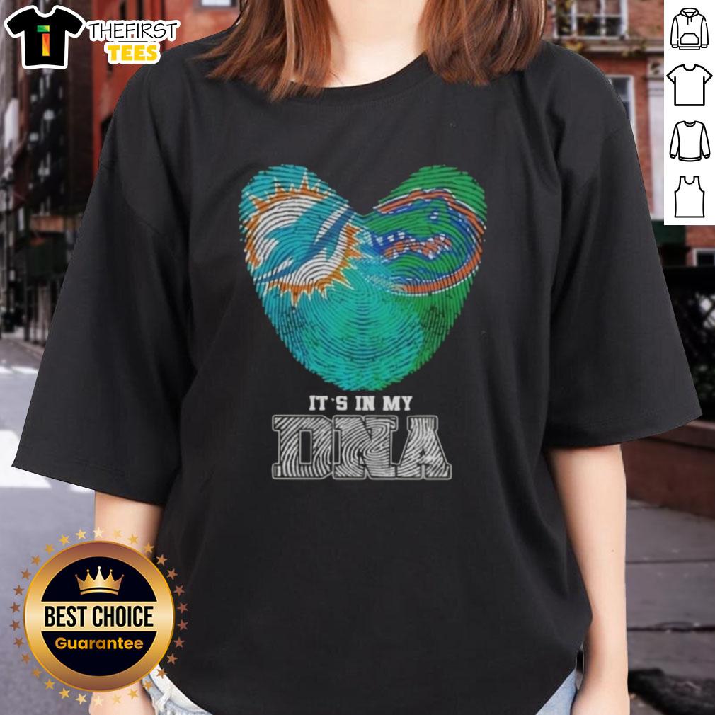 Miami Dolphins and Florida Gators women's tee featuring 'It's In My DNA' and top fingerprints design.
