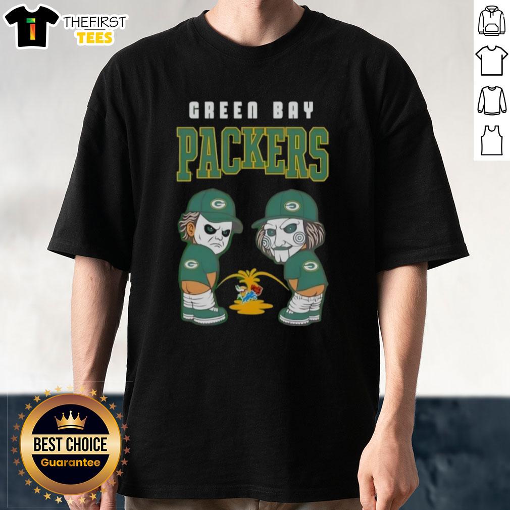 Alt Text: Top Green Bay Packers X Michael Myers and Billy The Puppet graphic t-shirt featuring iconic horror elements.