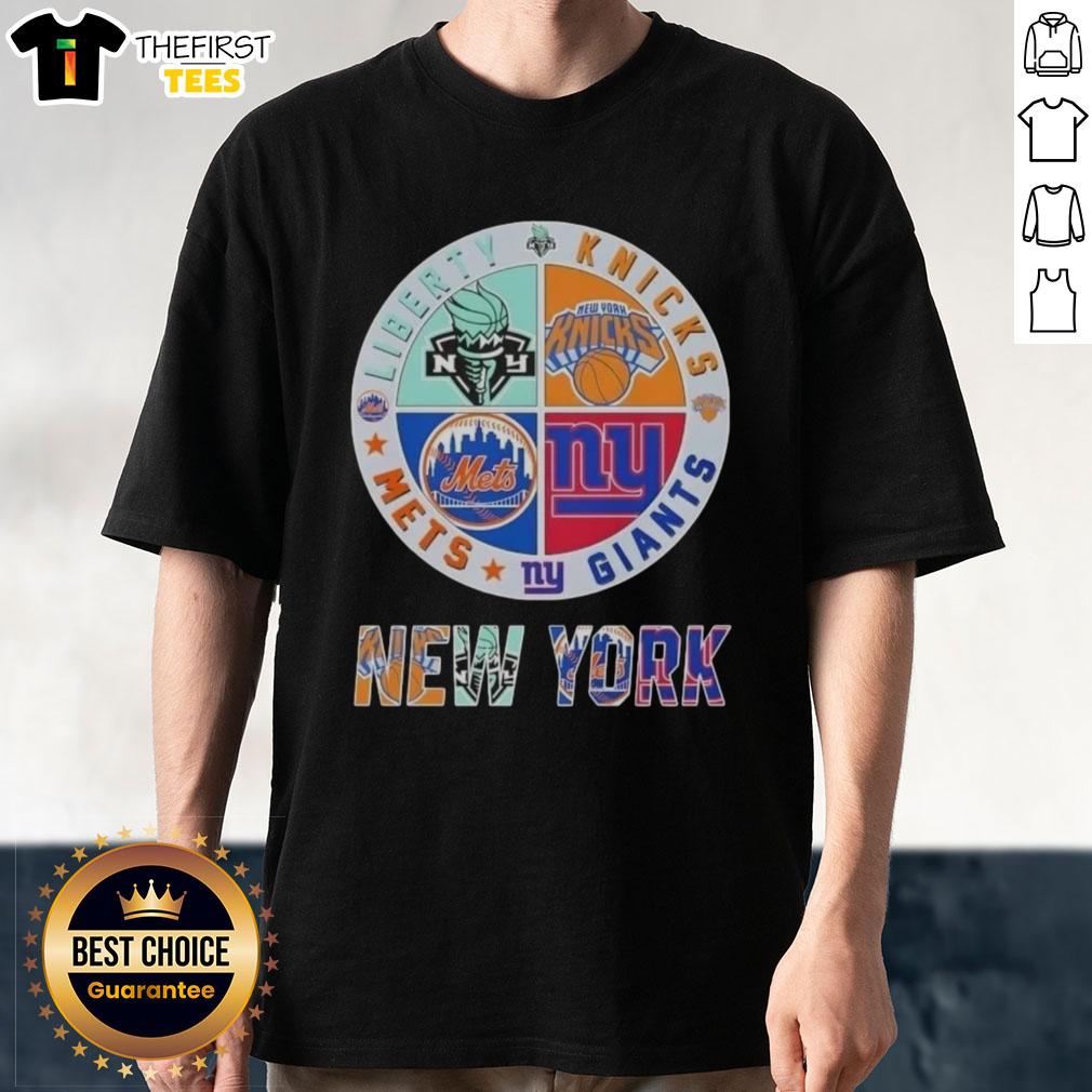 Alt Text: Top New York City Sports T-Shirt featuring Liberty, Knicks, Giants, and Mets logos in a stylish design.