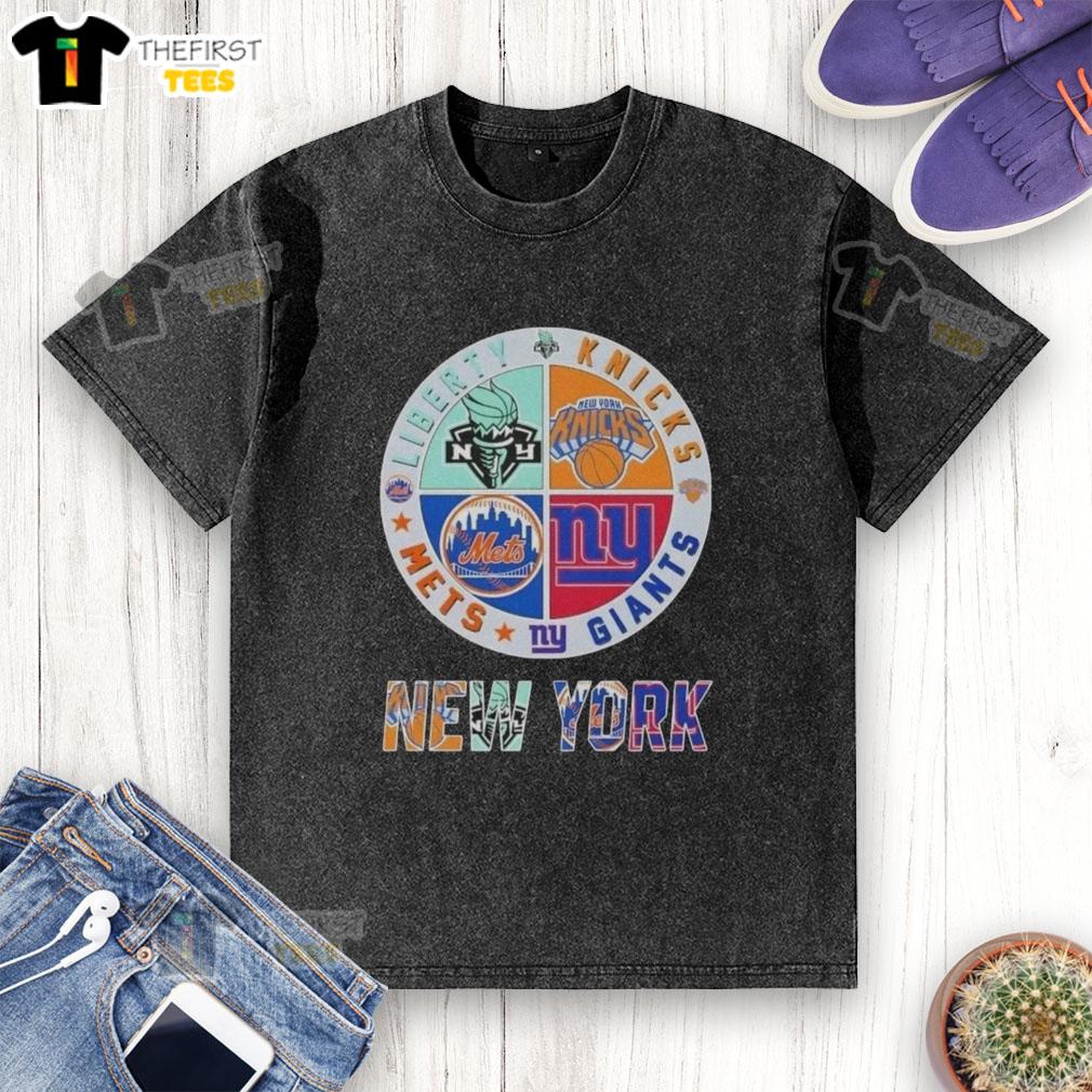 Alt Text: Top New York City sports logos on a washed t-shirt featuring Liberty, Knicks, Giants, and Mets designs.