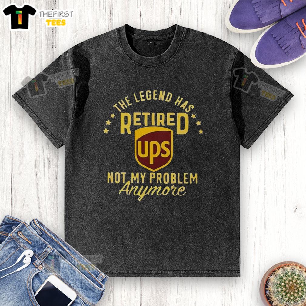 Alt Text: Top The Legend Has Retired washed t-shirt, featuring a humorous design, perfect for casual wear and fan apparel.