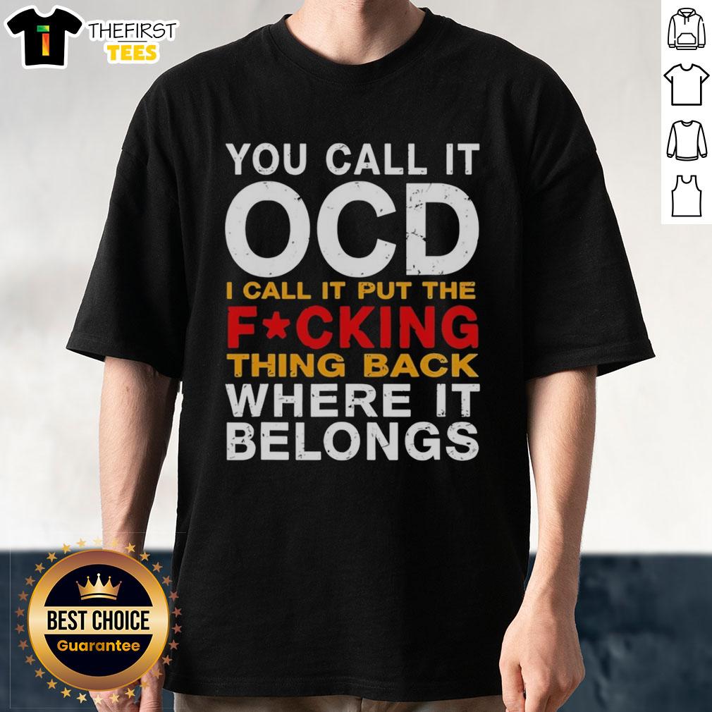 Funny 'You Call It OCD I Call It Put The Fcking Thing Back Where It Belongs' T-Shirt showcasing a humorous design.