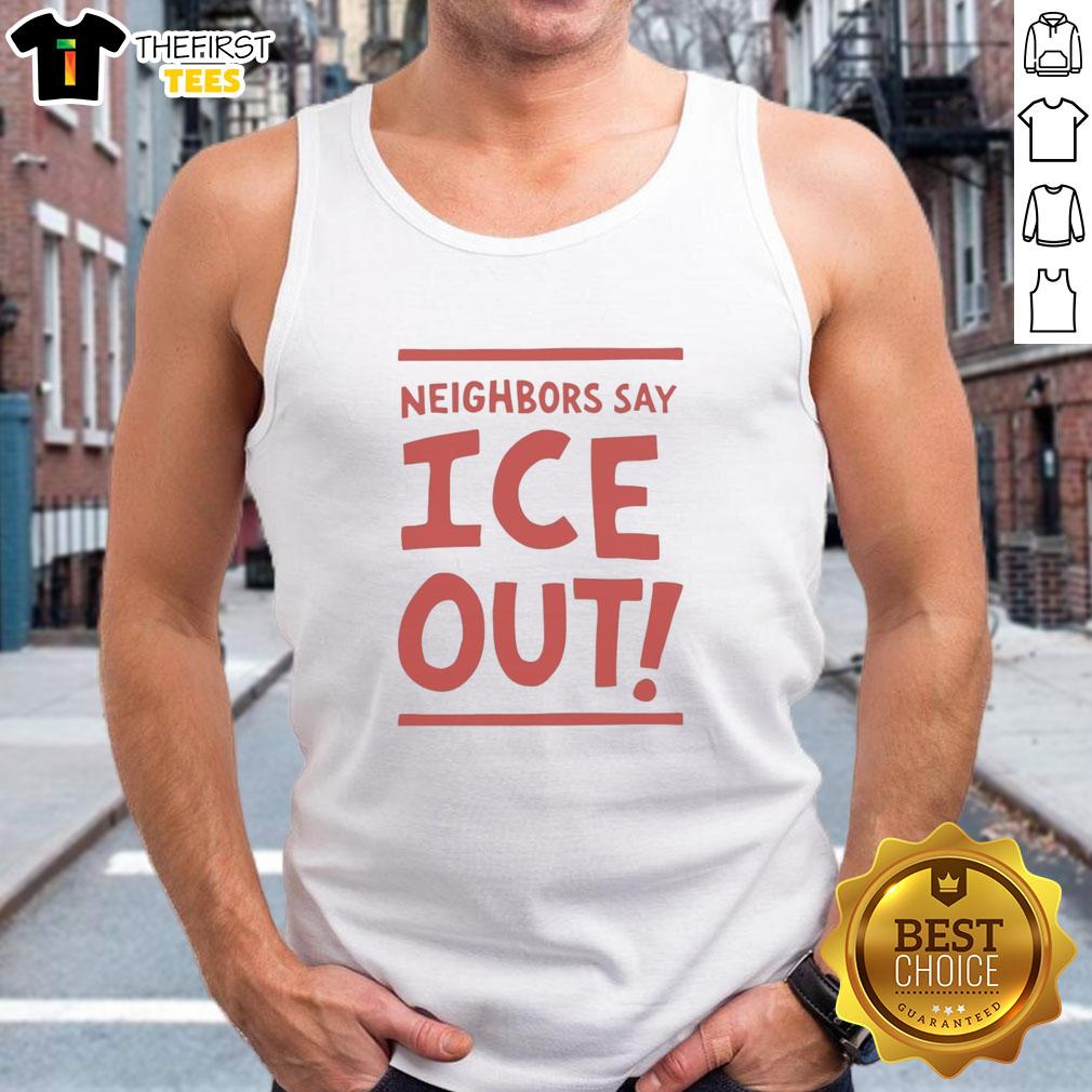 Alt Text: Awesome neighbors wearing 'Ice Out' tank tops on the streets of Minneapolis, showcasing community spirit and style.