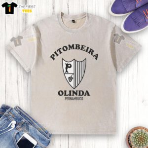 Wagner Moura wearing a Pitombeira washed t-shirt in Olinda, Pernambuco, showcasing vibrant local culture.