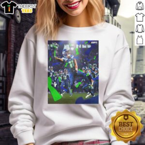 Jaxon Smith-Njigba celebrates with Seattle Seahawks Super Bowl LX Champions 2026 sweatshirt in vibrant colors.
