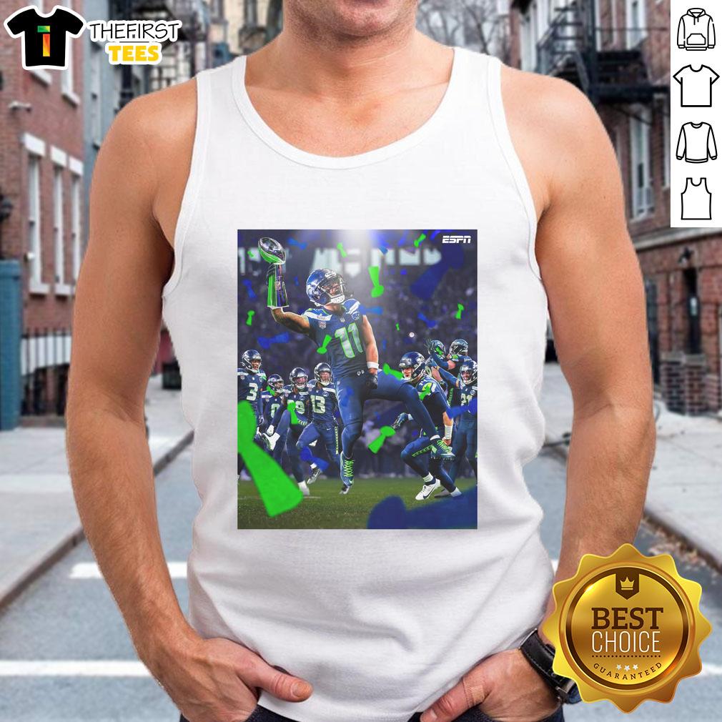 Good Jaxon Smith-Njigba celebrates Super Bowl LX victory in a Seattle Seahawks tank top, showcasing team pride.