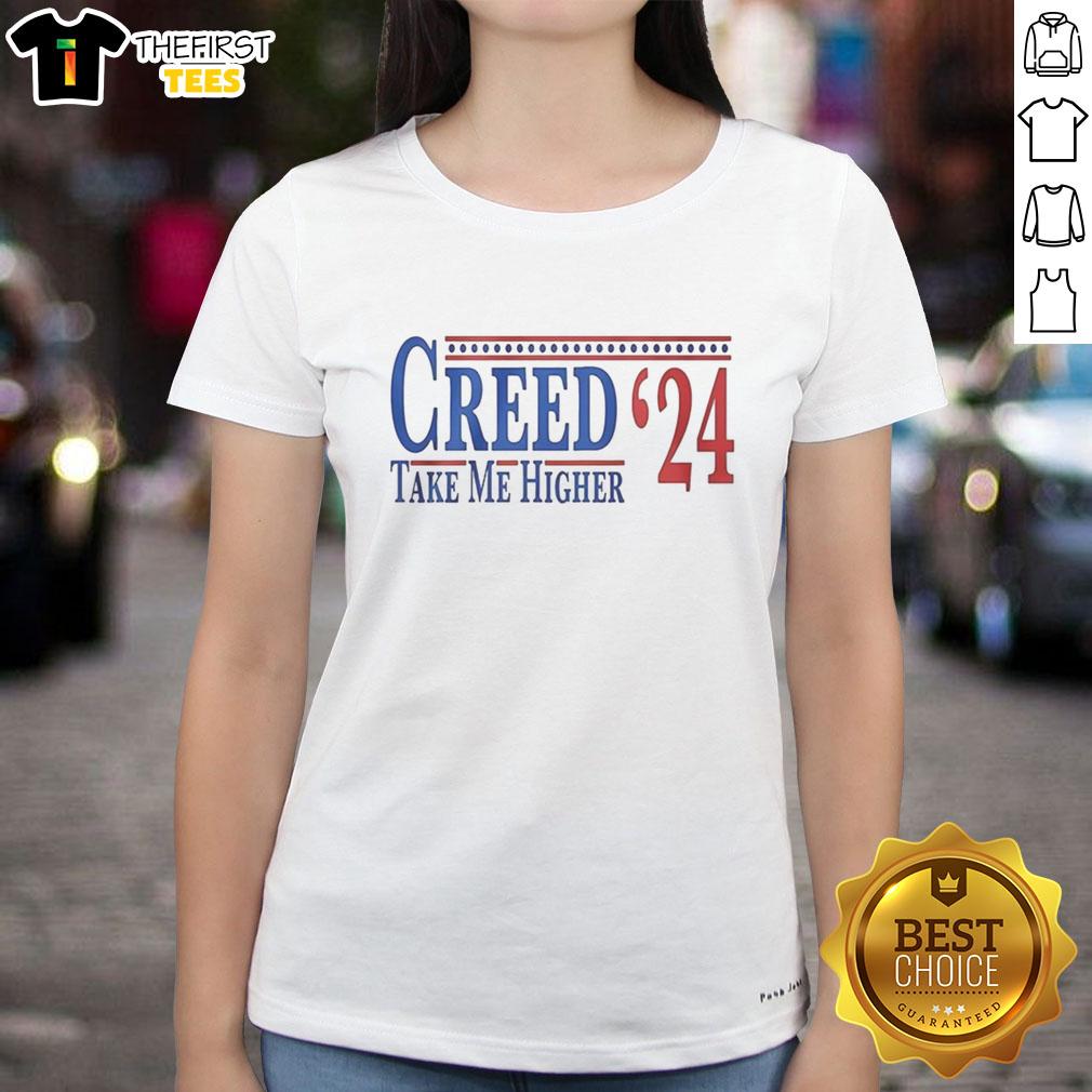 Top Creed 2024 Take Me Higher Ladies Tee in vibrant colors, perfect for stylish casual wear and fashion-forward looks.