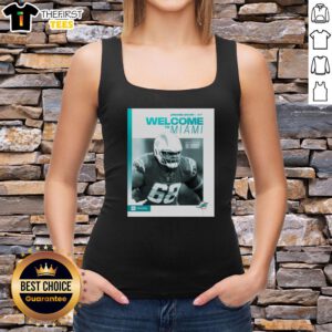 Hot Jamaree Salyer in Miami Dolphins 'Welcome to Miami' tank top, showcasing team spirit and summer style.