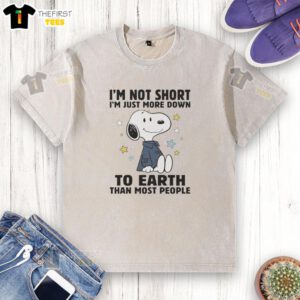 Pretty Snoopy t-shirt with 'I'm not short, I'm just more down' slogan, perfect for casual outings and fans of Peanuts.